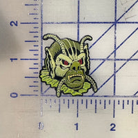 She Creature Enamel Pin